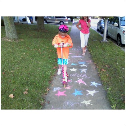 Ella Rose and their Mom drew stars on the sidewalk between their houses.